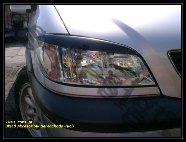 Brewki na reflektory, na lampy przednie do samochodu Opel Zafira A -1013900 ABS